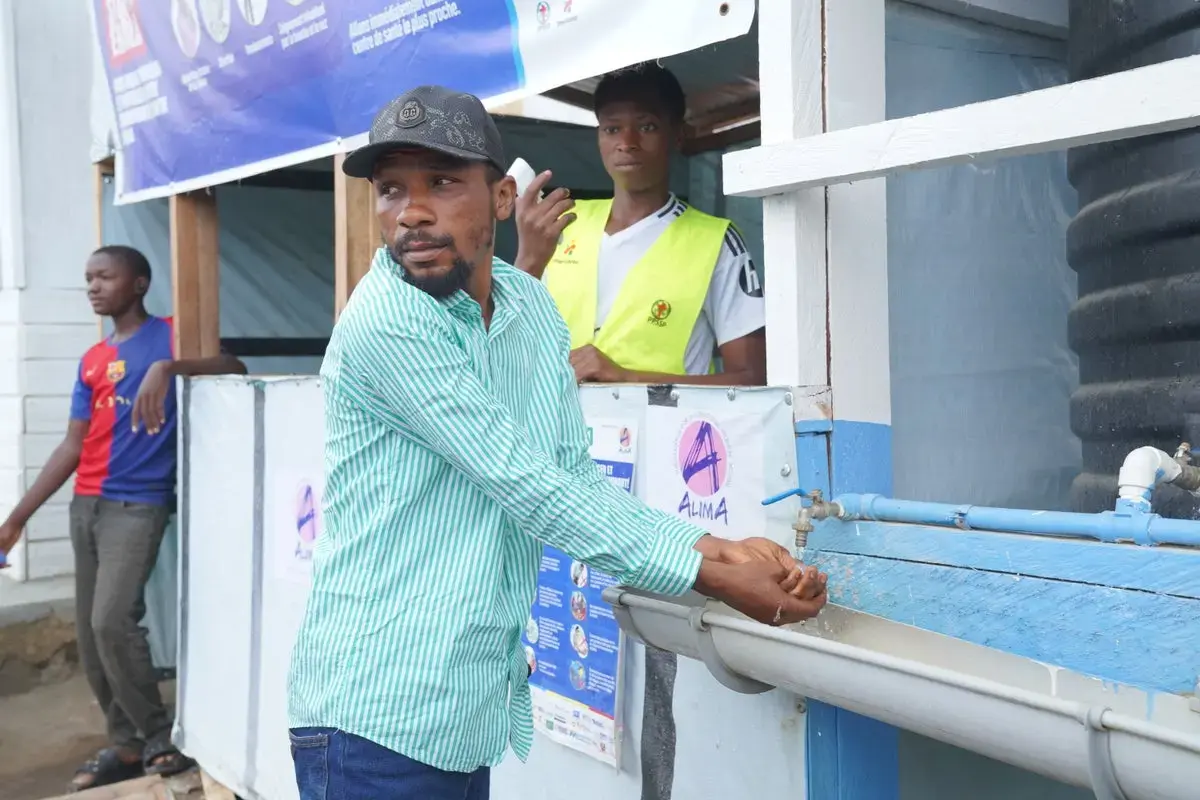 Unpaid Health Workers Lead the Frontline Fight Against Rapid Ebola Surge